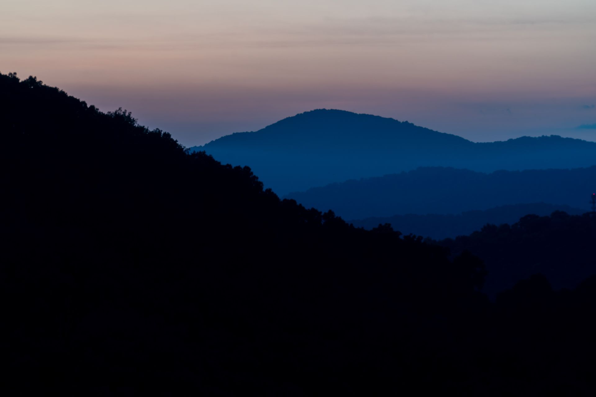 Layered Blue Ridge Mountains at golden hour near Asheville, North Carolina